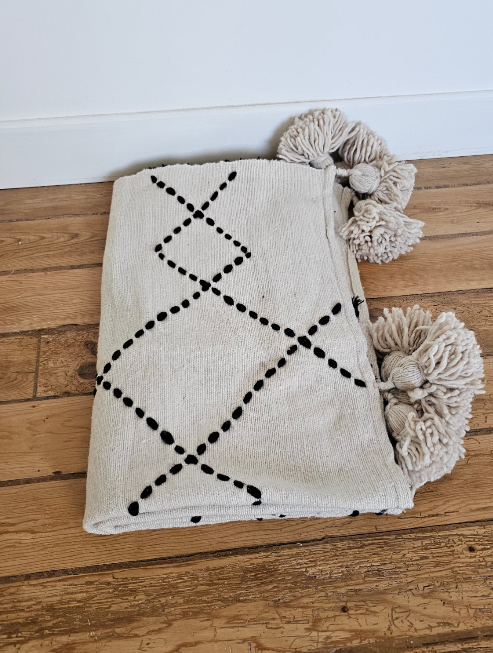 Plaid marocain à pompons