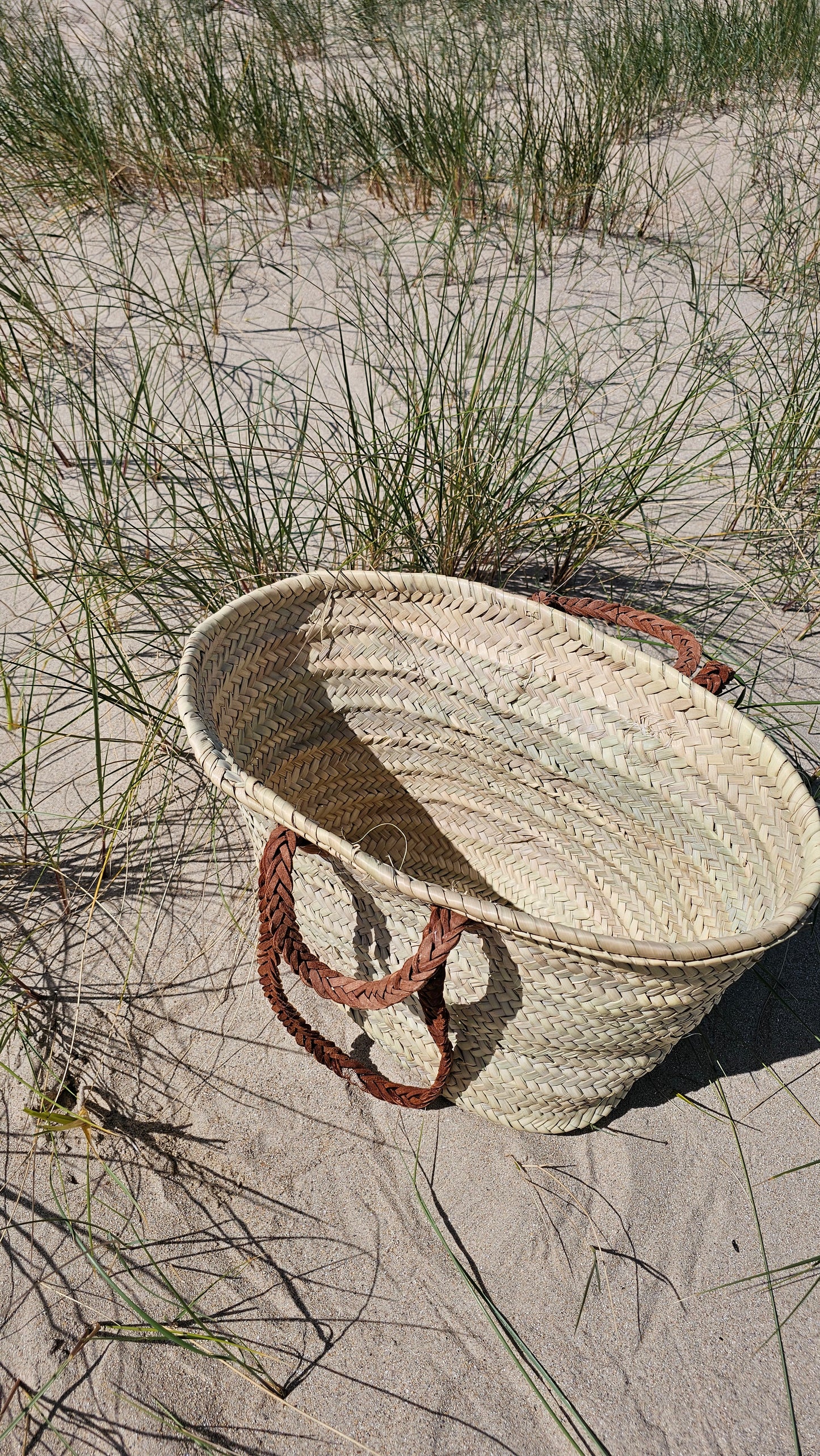 Panier anses en cuir tressées